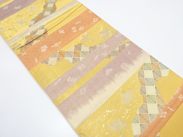 横段に松・宝尽くし模様織り出し　袋帯